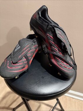 adidas Black Soccer Cleats with Red Accents